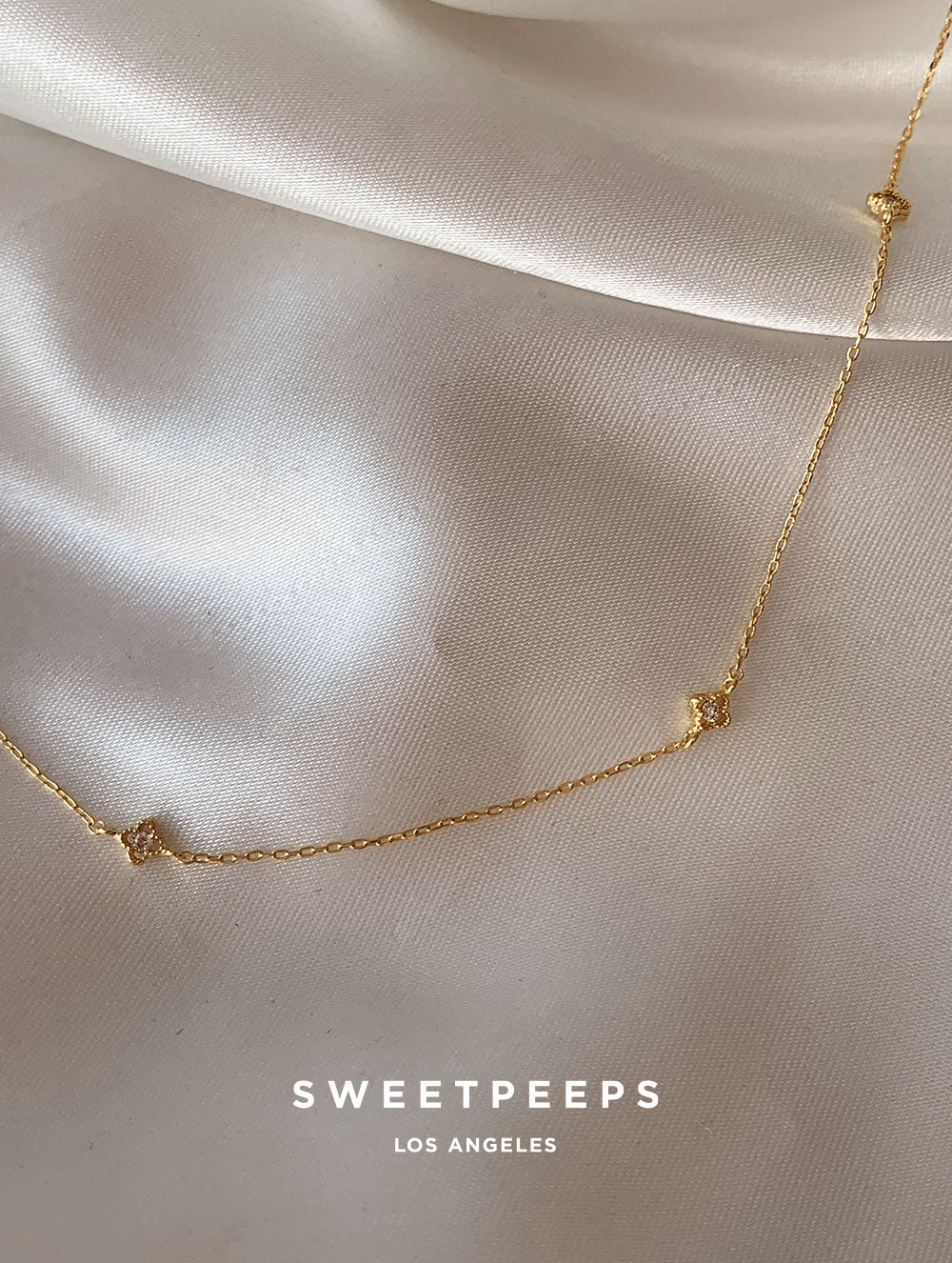 Tiniest Quatrefoil Clover Charm Necklace