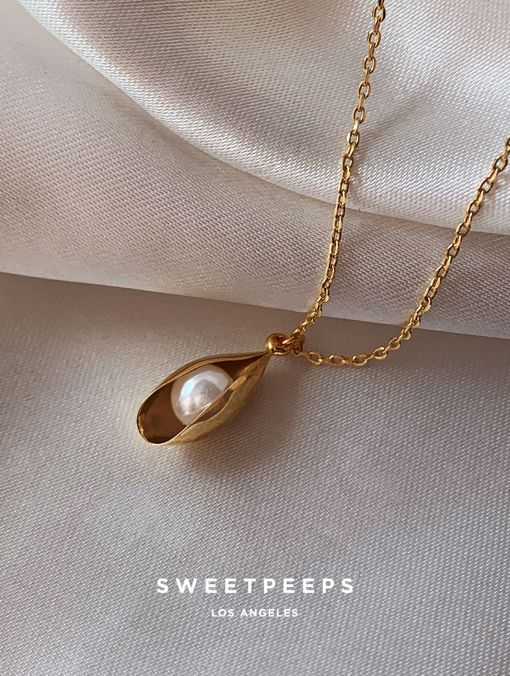 Pearl In Clam Necklace