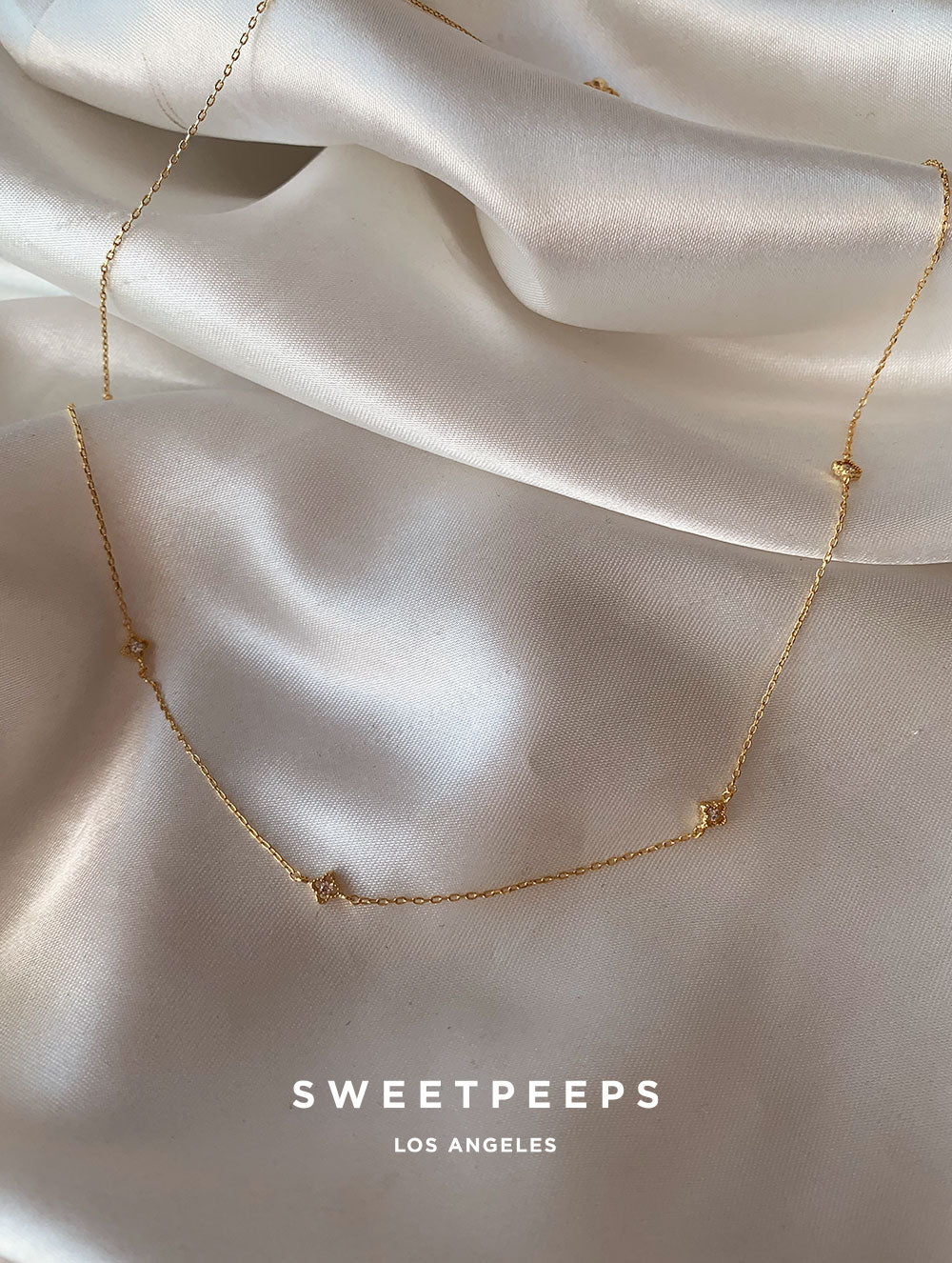 Tiniest Quatrefoil Clover Charm Necklace