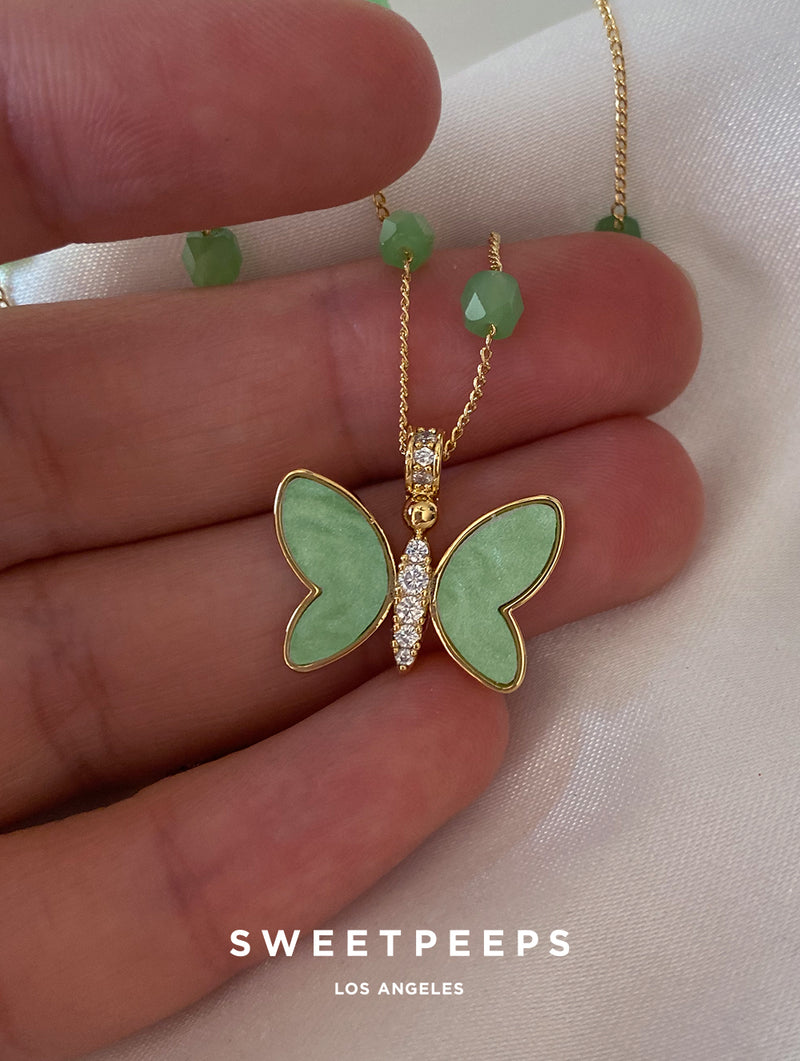 Green Glitter Butterfly Charm Necklace (Golden) at Rs 50/piece | Charm  Necklace in New Delhi | ID: 2850319144248