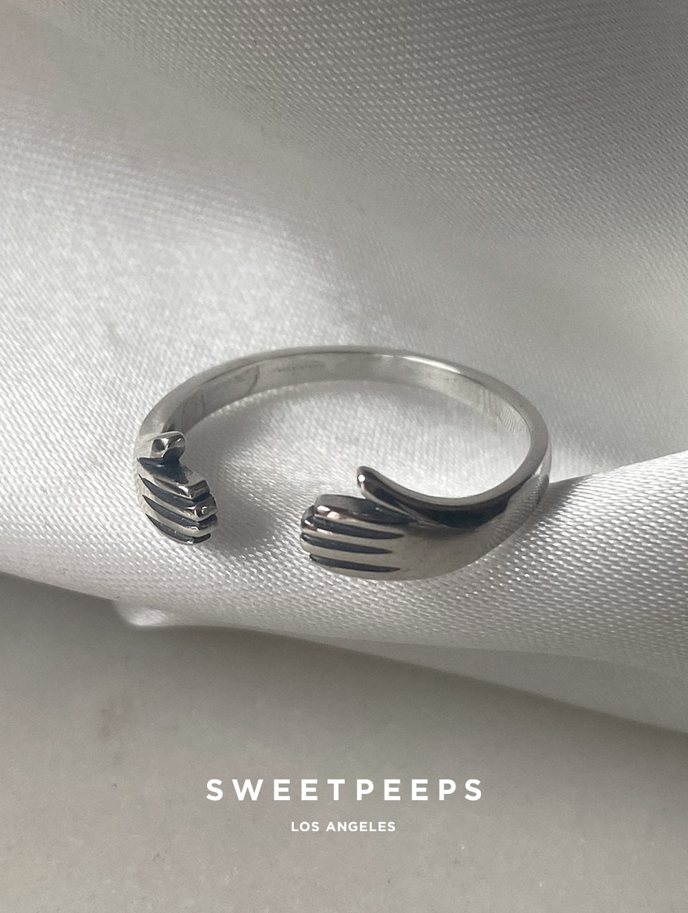 Sterling Silver Hugging Hands Ring