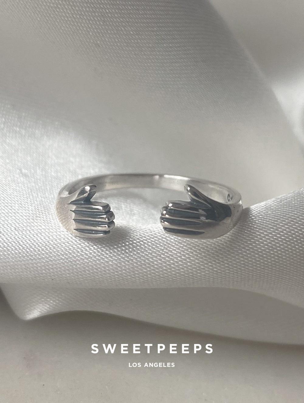 Sterling Silver Hugging Hands Ring